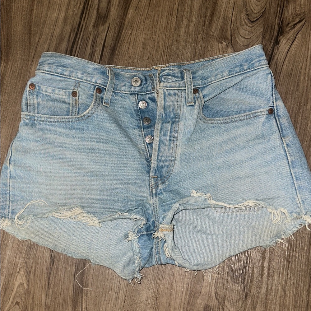 Levi’s 501 Distressed Light Blue Denim Shorts
